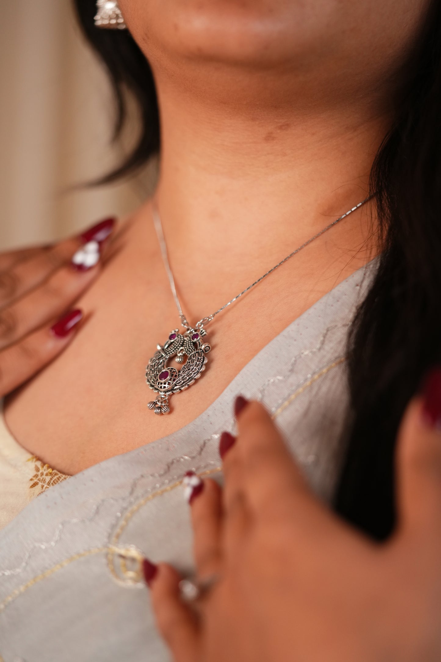 Reeva Peacock River Charm