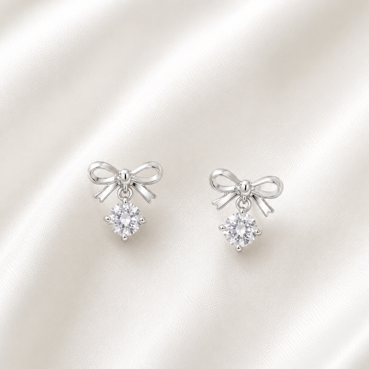 Grace Bow Drop Studs – 925 Sterling Silver